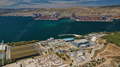 Aerial drone photo of latest technology sewage and sludge processing plant in small island of Psitalia or Psyttaleia, Piraeus, Attica, Greece photo