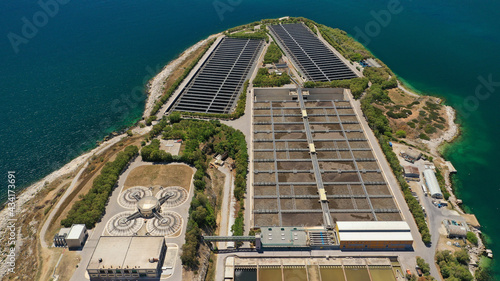 Aerial drone photo of latest technology sewage and sludge processing plant in small island of Psitalia or Psyttaleia, Piraeus, Attica, Greece photo