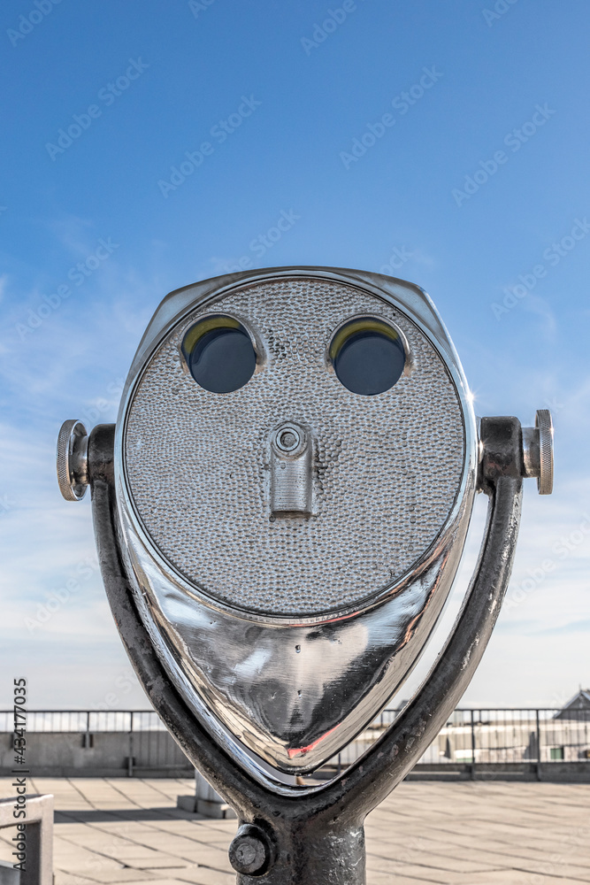 chrome telescope at the top of the mount Washington