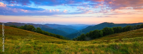 awesome summer sunrise scenery  stunning landscape in the mountains  mountains hills and wonderful morning sky  