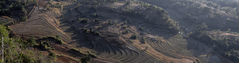 Viewpoint looking over terraced rice fields during sunset, Myanmar Viewpoint looking over terraced rice fields during sunset, Myanmar
