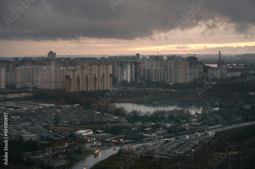 Rooftop view of Kyiv Ukraine. Dramatic sky after the rain. Clouds with silver lining.