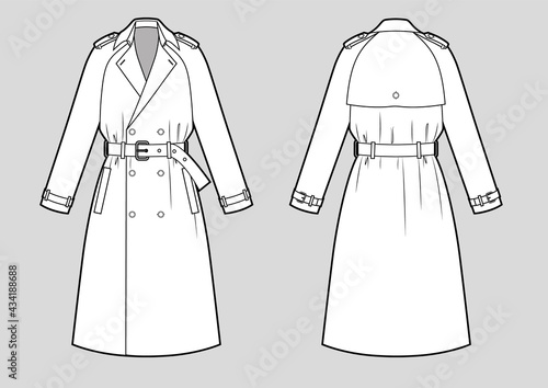 Classic trench coat with raglan sleeves and belt . photo