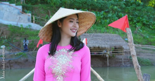 Girl In National Costume Of Vietnam Walking On Bamboo Bridge
 photo