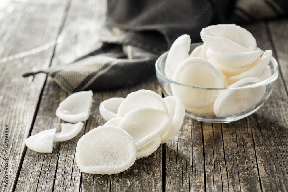 Puffed white snack chips. White potato chips. Puffed white snack chips. White potato chips.