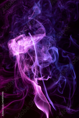 Multicolor Smoke painting on Black Background. Abstract. © Zbignev