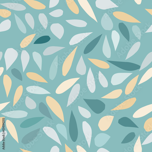 Seamless baby pattern with yellow, black and green hand drawn leaves on a pastel green blue background. The pattern can be used for wrapping papers, cards, covers, textile prints. Vector, eps 10.