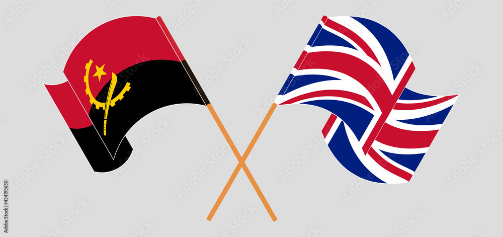 Crossed and waving flags of Angola and the UK Crossed and waving flags of Angola and the UK