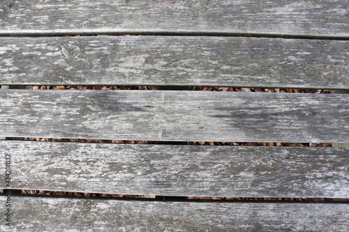 Wooden picnic table top weathered and gray