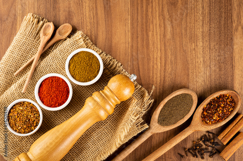 Variety of spices and seasonings on the table. photo