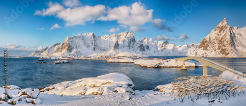 Panoramic winter view on  Reine and Sakrisoya villages  and bridge to Olenilsoya island.