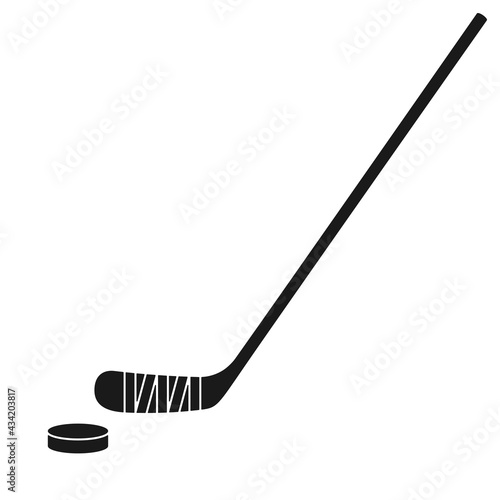 Ice hockey stick and hockey puck in vector icon