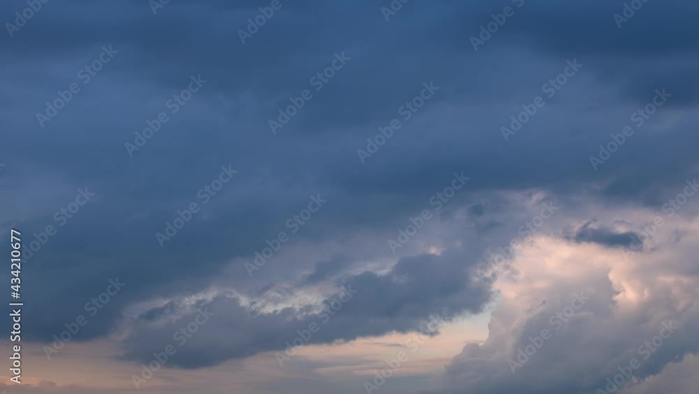 Fluffy cumulus clouds moving fast in time-lapse. Evening sky, cloudy heaven motion background. Timelapse of beautiful rainy clouds transforming in sky, cloudscape, cloud overhead Fluffy cumulus clouds moving fast in time-lapse. Evening sky, cloudy heaven motion background. Timelapse of beautiful rainy clouds transforming in sky, cloudscape, cloud overhead