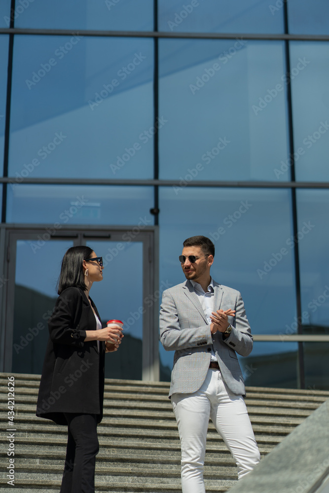 Two business poeple are talking