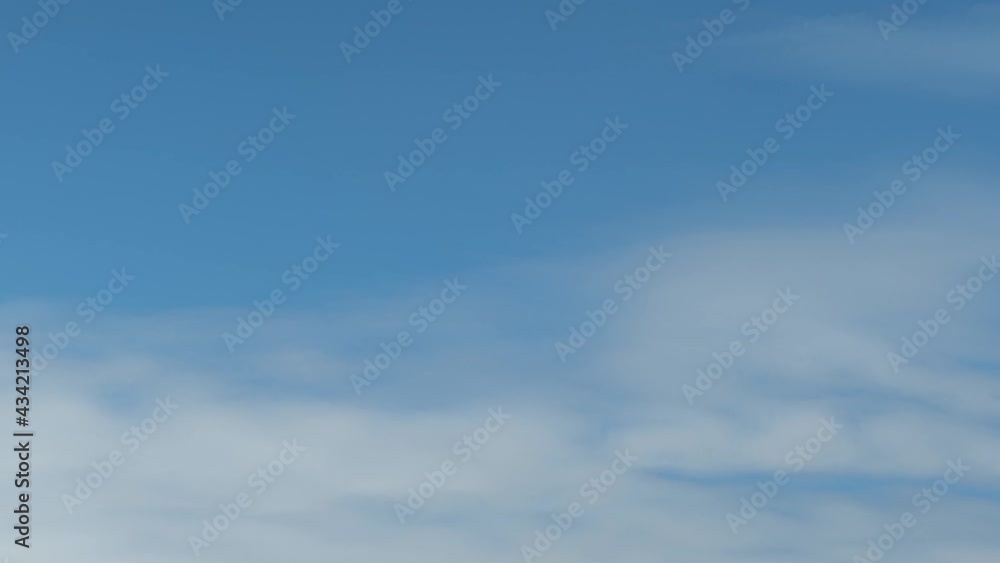 4K Sky Time lapse, Beautiful background, Sky Timelapse of skyscrapers, Blue sky with clouds and sun, Clouds At Sunrise. 4K Sky Time lapse, Beautiful background, Sky Timelapse of skyscrapers, Blue sky with clouds and sun, Clouds At Sunrise.