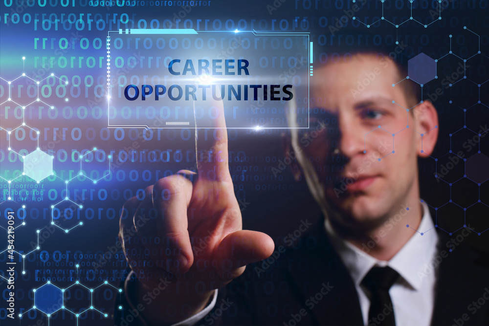 Business, Technology, Internet and network concept. Young businessman working on a virtual screen of the future and sees the inscription: Career opportunities Business, Technology, Internet and network concept. Young businessman working on a virtual screen of the future and sees the inscription: Career opportunities