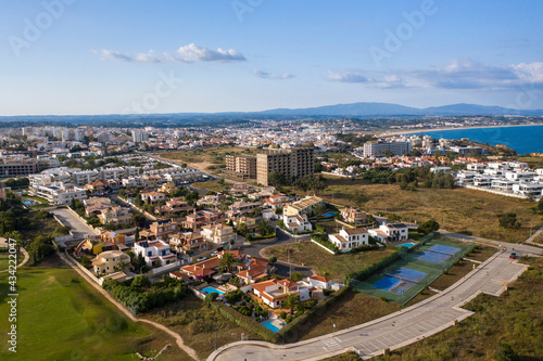 Canavial Beach. Portuguese southern golden coast cliffs. Aerial view over city of Lagos in Algarve, Portugal.