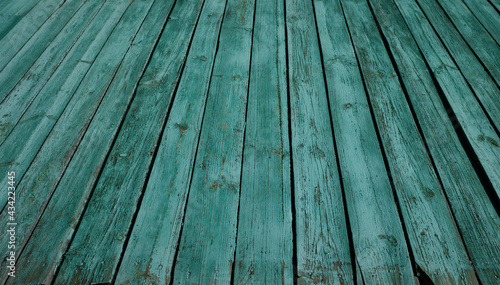 Background, texture. Wooden fence, old green paint.