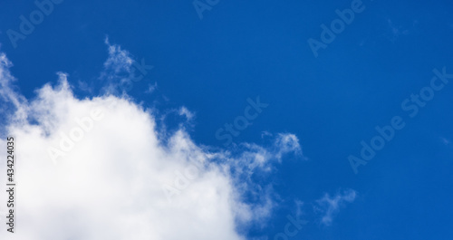 View of Cloudscape during a colorful and sunny spring day. Taken on the West Coast of British Columbia, Canada.