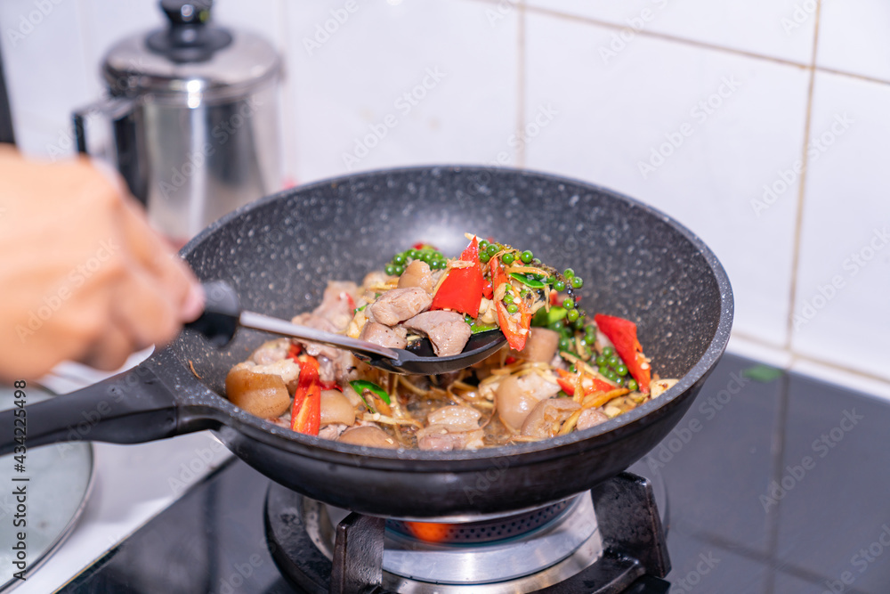 spicy stir fried slice pork leg with peppers. spicy stir fried slice pork leg with peppers.