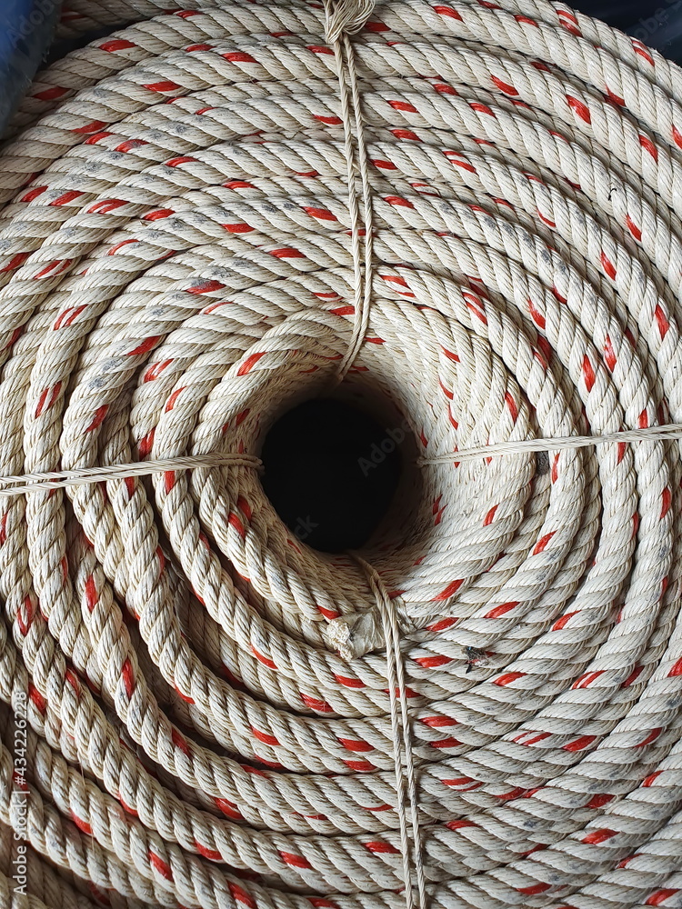 Top view of a large manila rope woven into a valley or polypropylene rope  wrapped in