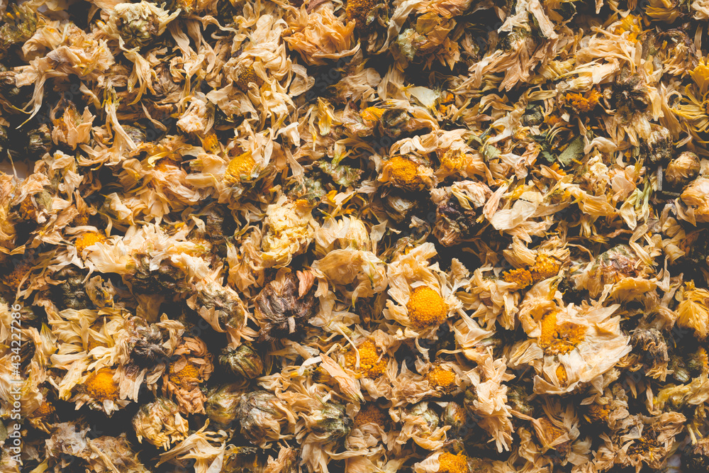 Close up of Dried Chrysanthemum, the herb is often used as a health care Close up of Dried Chrysanthemum, the herb is often used as a health care