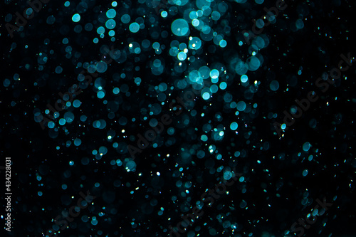 Vintage black bokeh created by neon lights with black background