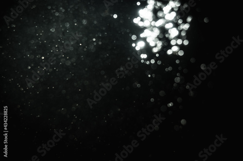 Glittering stars of blur white bokeh