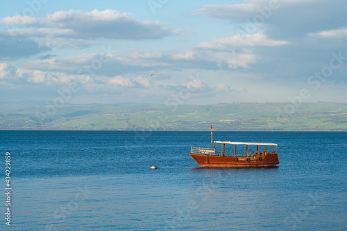 Fotografiet Boat on the sea of galilee, Lake Tiberias, Kinneret, in israel