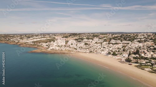 Idyllic scenery of Praia da Luz in Algarve Coastline, near Lagos - Aerial wide photo