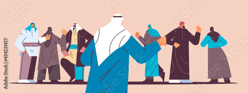 arabic people group in traditional clothes standing together and discussing during meeting horizontal