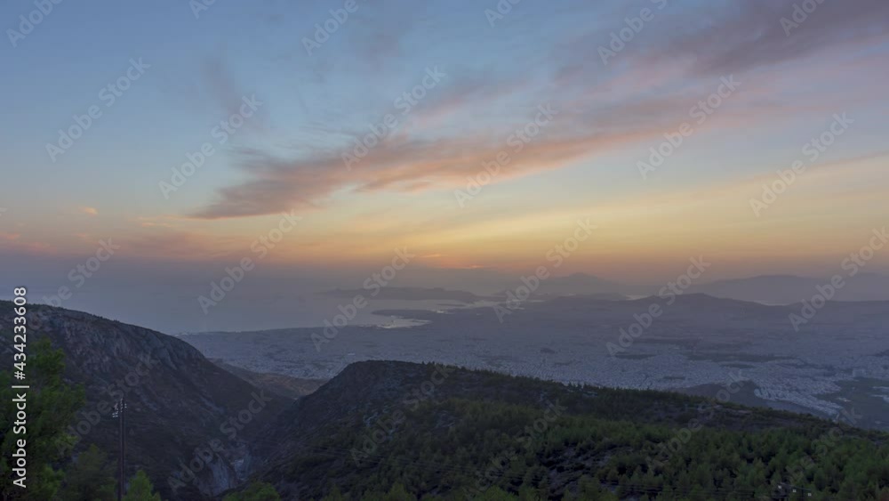 Beautiful day to night sunset time lapse over Athens Greece seen from the top of Ymittos Beautiful day to night sunset time lapse over Athens Greece seen from the top of Ymittos