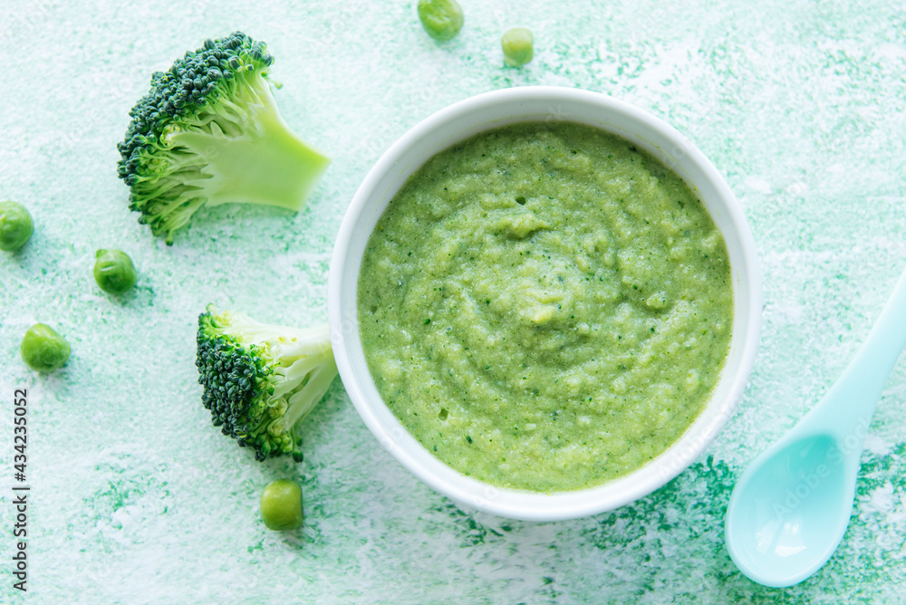 Baby food. Organic green broccoli puree with ingredients. Baby food. Organic green broccoli puree with ingredients.
