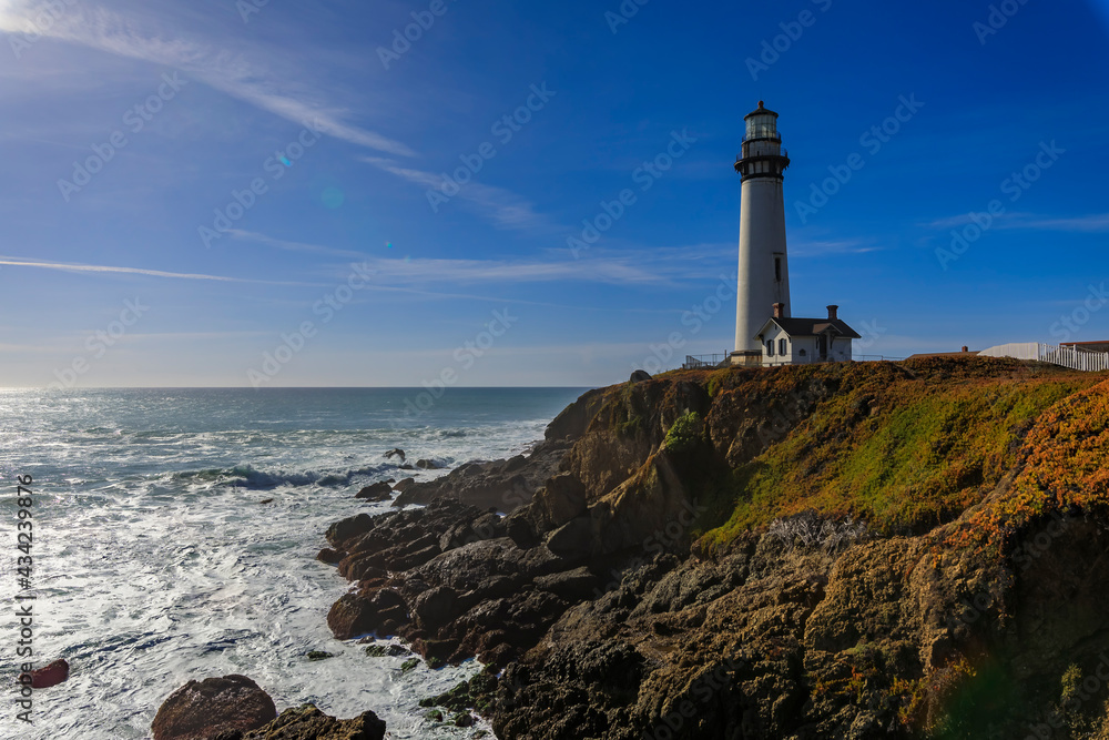 Waves crashing on the shore by Pigeon Point Lighthouse on Northern California Pacific Ocean coastline near Pescadero