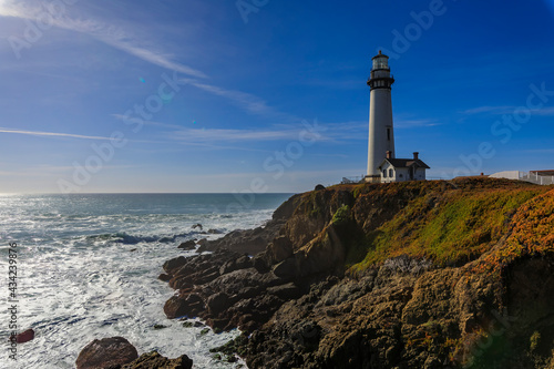 Waves crashing on the shore by Pigeon Point Lighthouse on Northern California Pacific Ocean coastline near Pescadero