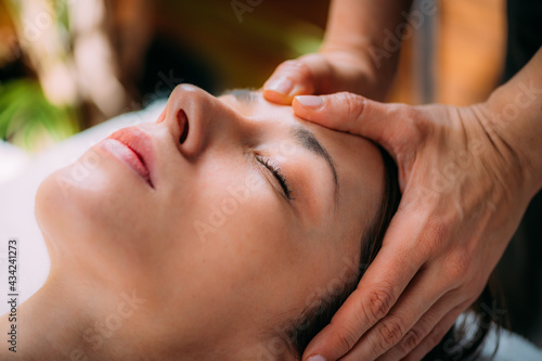 Craniosacral Therapy Head Massage for Pain and Migraine Relief. photo