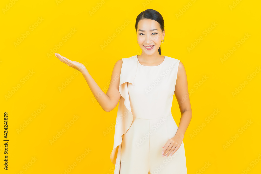 Portrait beautiful young asian woman smile with action Portrait beautiful young asian woman smile with action