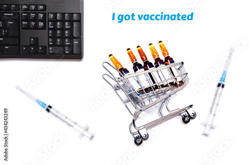 Text design I got vaccinated, lettering for covid-19 coronavirus pandemic. Shopping cart and vaccine bottles for corona virus disease