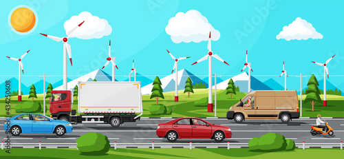 Suburb Road With Cargo Truck Trailer, Cars, Van And Motorbike. Road Over Mountains And Forest Landscape. Wind Turbines And Forest. Suburban Transportation And Cargo. Flat Vector Illustration