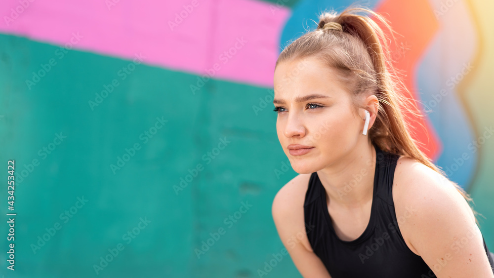 Young focused blonde woman at outdoors training Young focused blonde woman at outdoors training