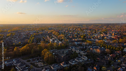 Drone photo of Bennekom, Gelderland. This photo is taken at sunset, the village is near to ede. Drone foto van bennekom, Gelderland. Zonsondergang van een dorp dicht bij ede.