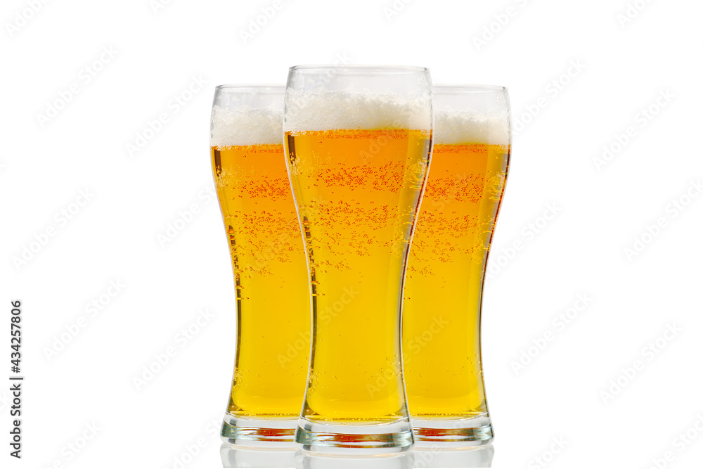 Fresh cold Beer glass isolated on white. gold beer bavaria oktoberfest with foam crown. pint of light lager beer on white background. Craft Beer close up Fresh cold Beer glass isolated on white. gold beer bavaria oktoberfest with foam crown. pint of light lager beer on white background. Craft Beer close up