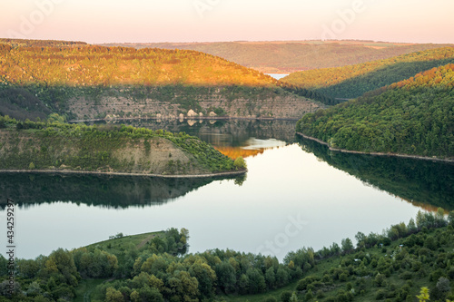 Sunset landscape in the national nature park Podilski Tovtry, canyon and Studenytsia river is tributary of Dnister river, view from above