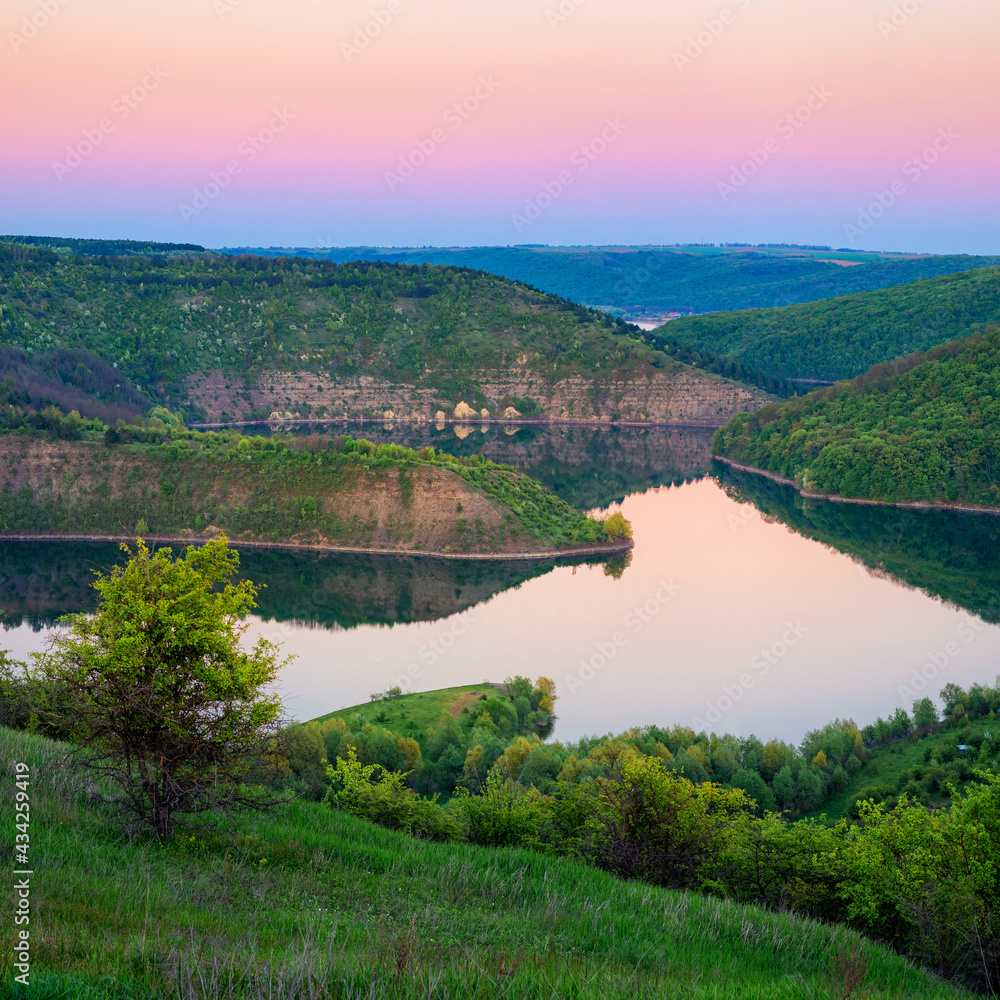 Sunset landscape in the national nature park Podilski Tovtry, canyon and Studenytsia river is tributary of Dnister river, view from above