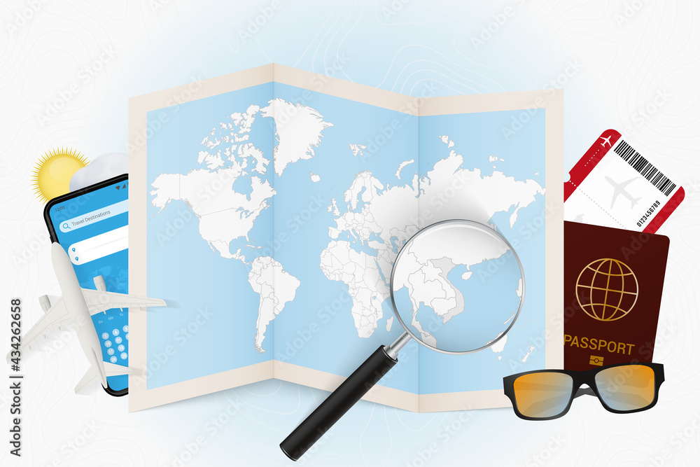 Φωτογραφία Travel destination Vietnam, tourism mockup with travel equipment and world map with magnifying glass on a Vietnam