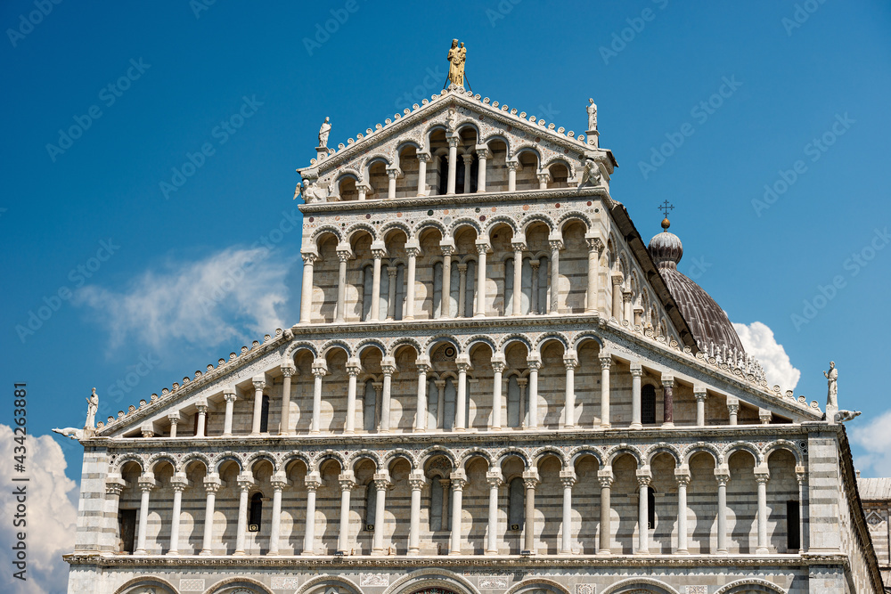 Main facade of the Pisa Cathedral (Duomo di Santa Maria Assunta), in Pisan Romanesque style, Piazza dei Miracoli (Square of Miracles). Tuscany, Italy, Europe. Main facade of the Pisa Cathedral (Duomo di Santa Maria Assunta), in Pisan Romanesque style, Piazza dei Miracoli (Square of Miracles). Tuscany, Italy, Europe.