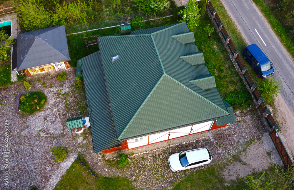 Top view of a beautiful metal roof of a house