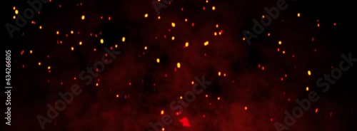 Fire embers particles over black background. 
Fire sparks background. 
Abstract dark glitter fire particles lights.