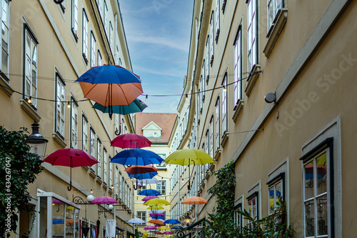 Umbrellas with different colors hanging in the  Courtyard and public passage Sue Fototapeta