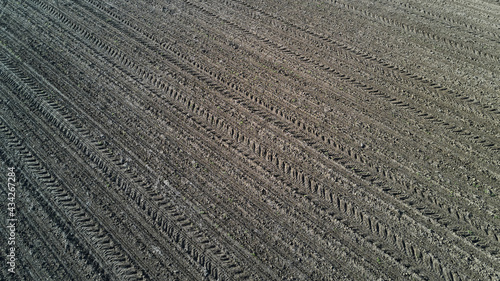 Plowed field from above. Preparation for sowing. Agricultural background